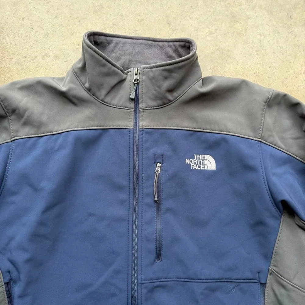 The North Face blue wind stopper fleece jacket size L